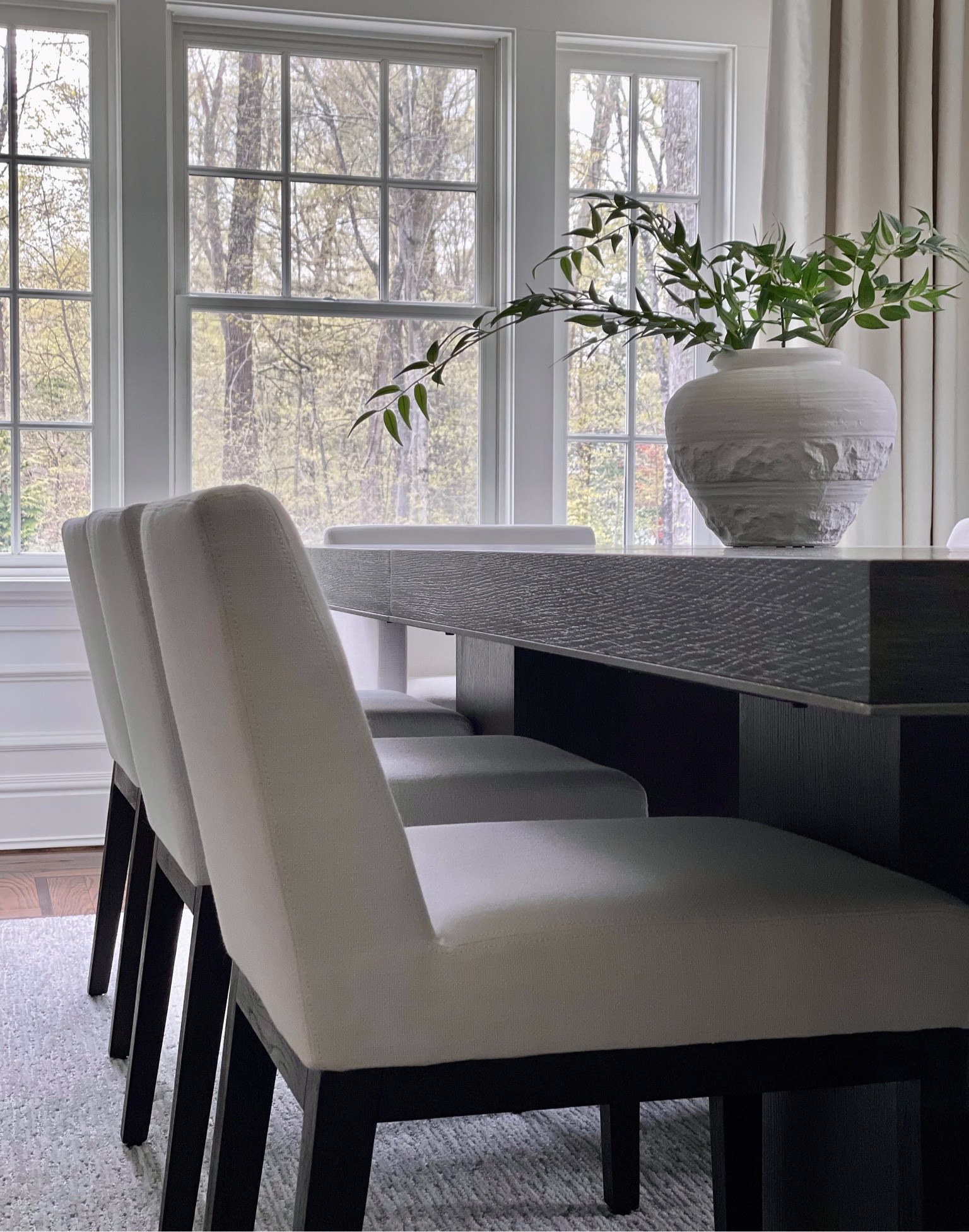 Linea Table by Bernhardt and chairs are from Restoration Hardware