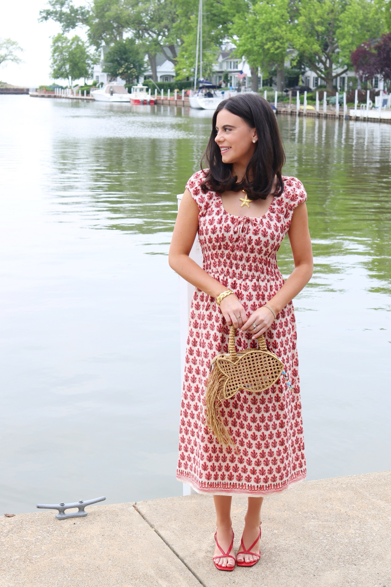 #ad #jcrew #sponsored Summer dress from @jcrew - I paired it with a pop of red heel and my fabulous fish raffia purse! #jcrewpartner #LTKxJ.Crew #LTKfinds 