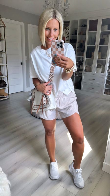 I love this neutral athleisure look!!! These are my favorite athletic shorts I’ve found yet!!!
⬇️⬇️💯
Tee size small
Shorts TTS but sized up to medium for roomy fit 
Shoes TTS

#LTKShoeCrush #LTKFitness #LTKStyleTip