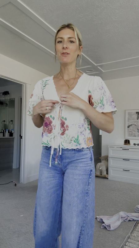 current favorite shirt and if you love the tie front trend this one shows no stomach 👌🏼 the florals are beautiful too! Still wearing my favorite $36 jeans that so many of you own and I snagged a neutral pair of adidas and they’re going to match with everything! Went a full size down and they’re perfect!

#LTKShoeCrush #LTKSeasonal #LTKStyleTip