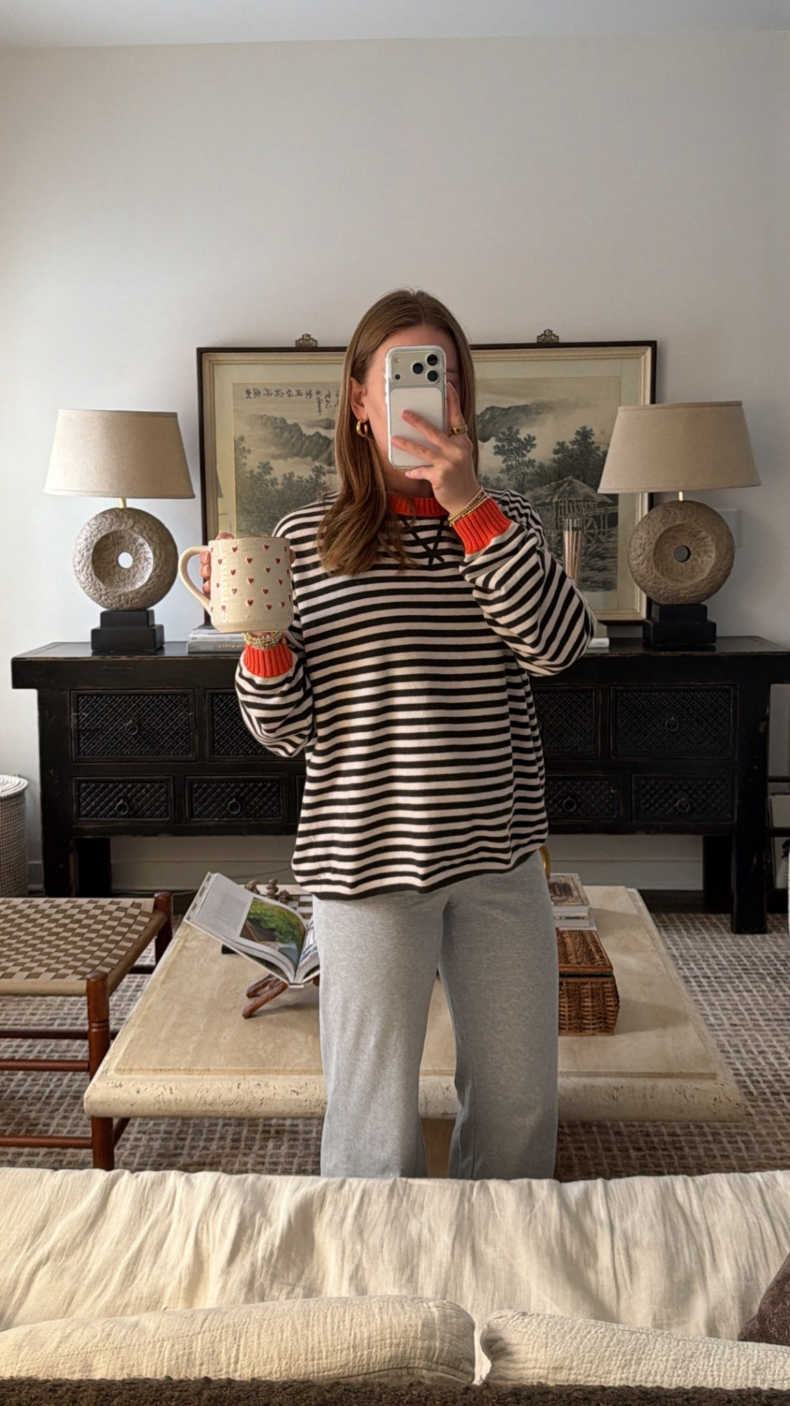 2/22/26 Casual morning loungewear 🤍 Wearing my Aritzia grey lounge pants paired with my Aerie brown striped sweater — soft, easy, and perfect for slow starts at home. 

#LTKmorningroutine #LTKootd