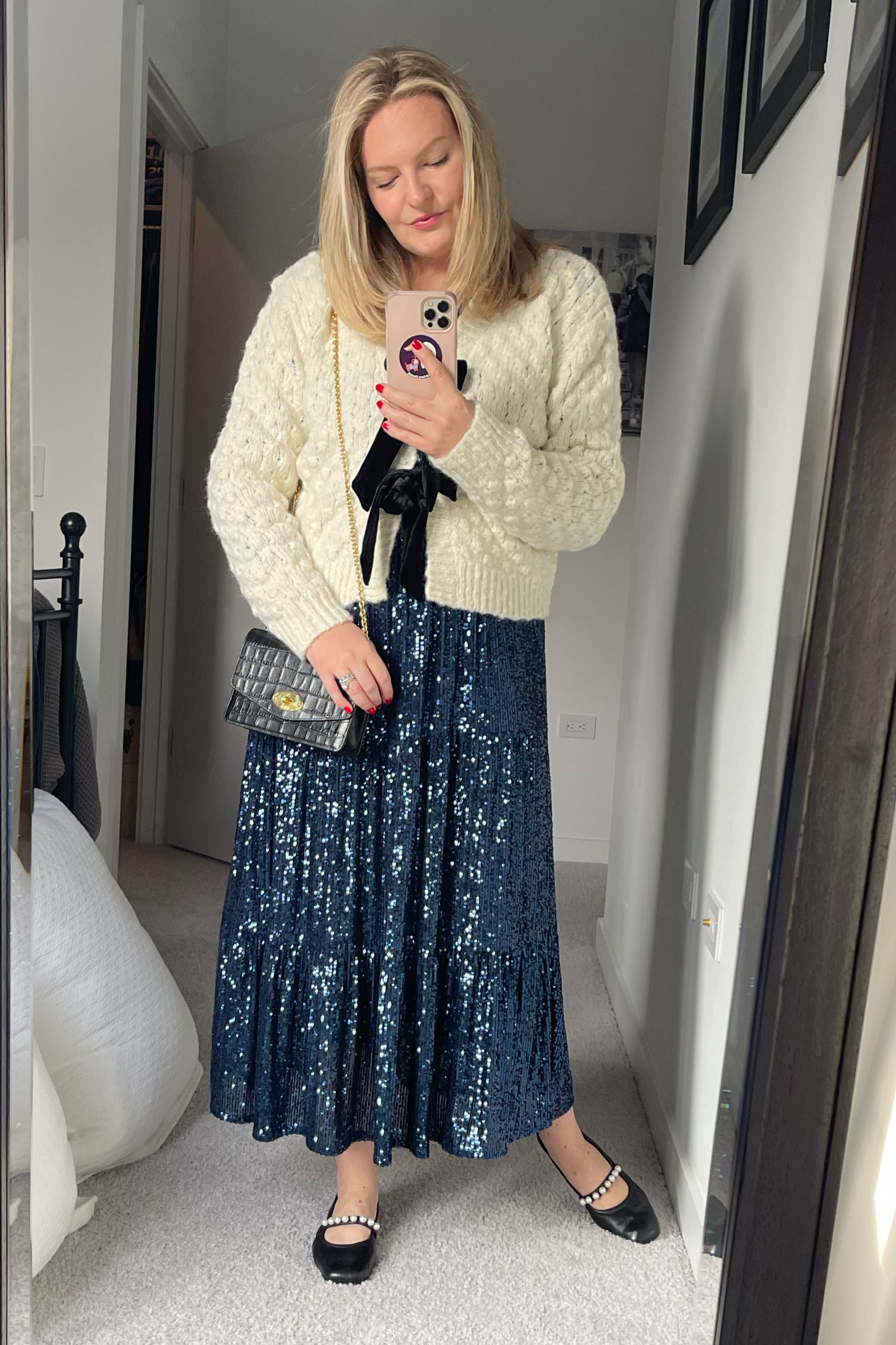 The sequin midi dress works really well with a sweater too! 

#LTKSaleAlert