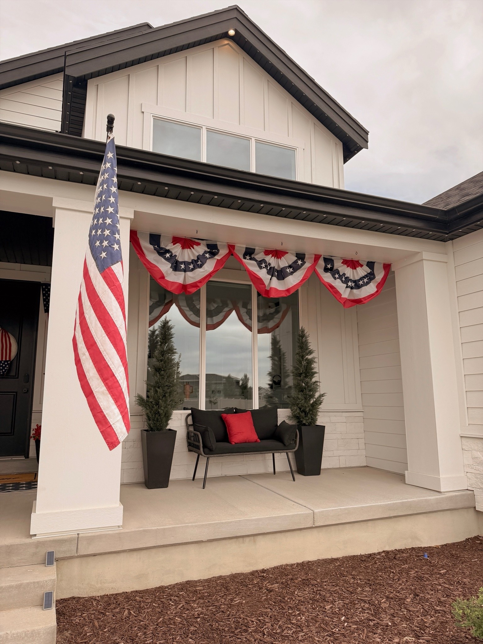 One of the easiest ways to make your porch feel festive for summer! 🇺🇸 I added patriotic bunting, our American flag, and a few simple accents for a classic red, white, and blue look that takes just minutes to put together. Perfect for Memorial Day, the 4th of July, and summer gatherings. Shop all of my patriotic porch favorites here! #LTKHome #PatrioticDecor #FourthOfJulyDecor #FrontPorchStyle #SummerDecor

#LTKSeasonal #LTKHome