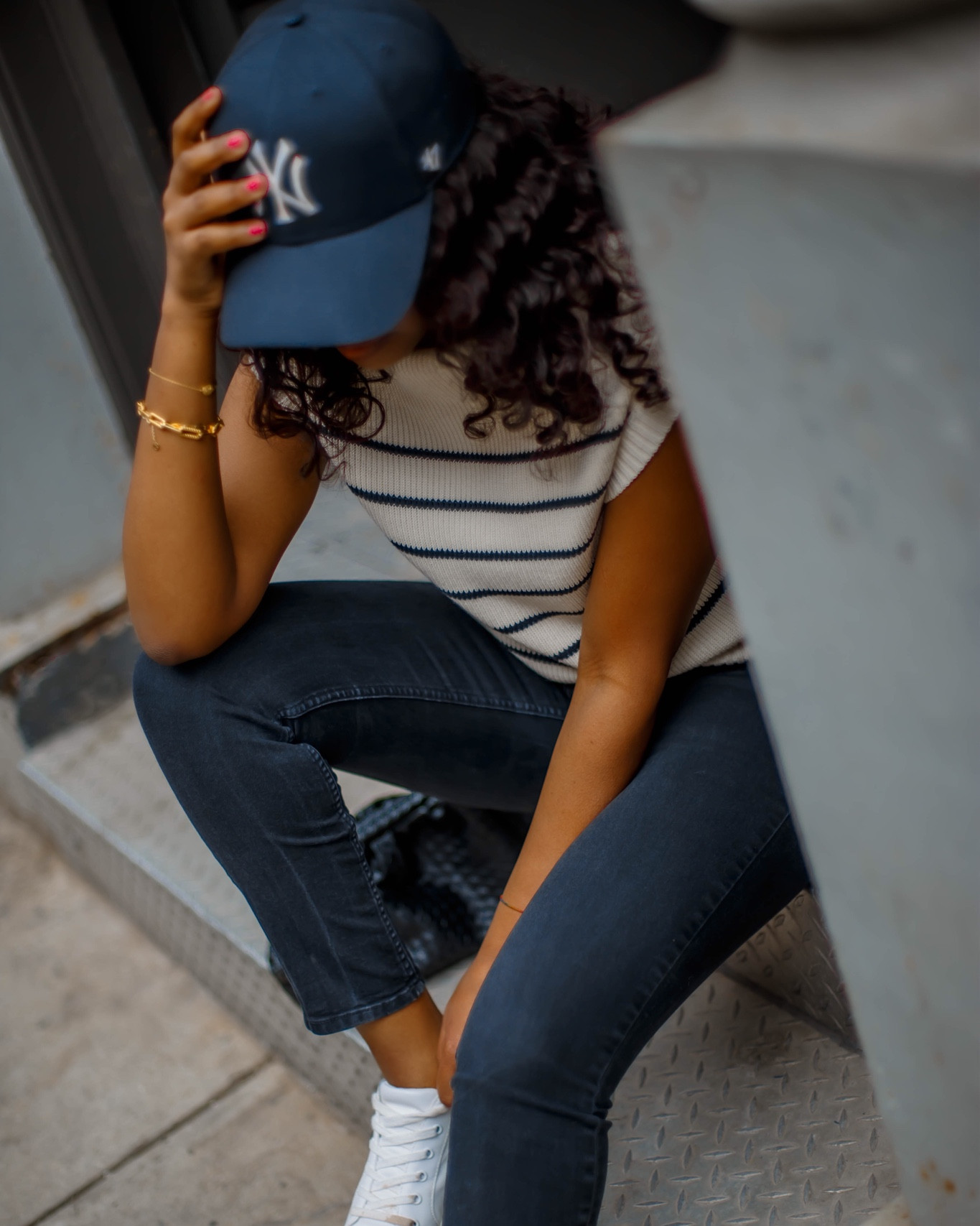 Still one of my favorite transitional fall outfits! This lightweight sleeveless knit top(wearing XS) is still hand down the best quality and perfect staple for your capsule wardrobe.

Anthropologie tops, knit tops, fall style, fall outfits, styling tips, casual outfit, NY baseball hat, black jeans, chunky bracelets, white sneakers #ltkfall

#LTKworkwear #LTKstyletip #LTKSeasonal