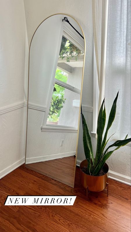New mirror! I got the 71 by 30 with the gold rim but it’s also available in black and in other sizes. It also has a bracket so it safely leans against the wall or can also be hung. #mirror #largemirror #goldmirror #archedmirror 

#LTKfindsunder100 #LTKhome #LTKsalealert