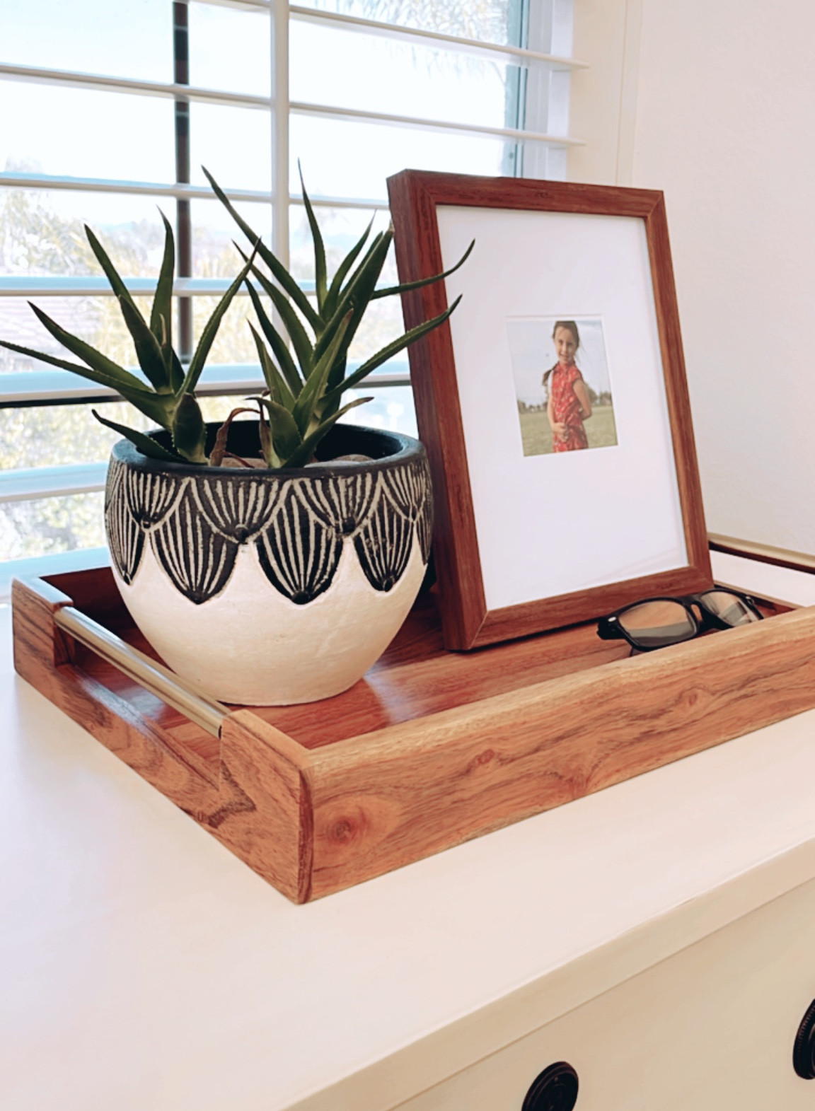 New decorative wood tray for the nightstand from Target. If you have a large nightstand use a tray to group items together and give yourself space to stash smaller items. 🙌🏻 #targetfind #nightstandstyling #nightstanddecor #woodtray #decorativetray