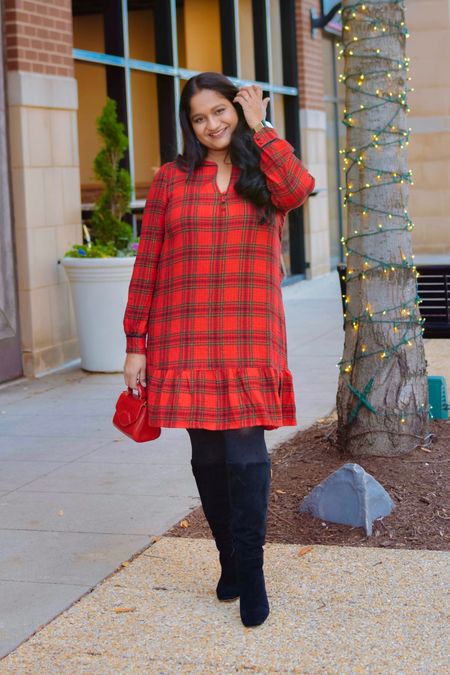 Office holiday outfit ideas #1 
@loft red plaid dress in size S 
@SamEdelman knee high boots 
Polka dot tights, bow Pearl earrings 

#LTKparties #LTKHoliday #LTKmidsize