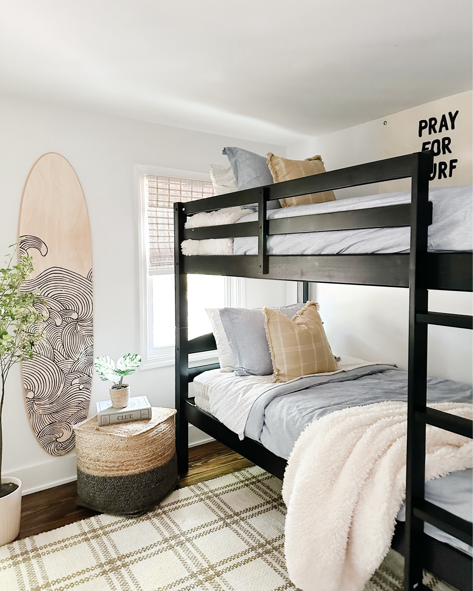 Coastal Surf Themed Bunk Room

Bunk bed, blue chambray comforter set,  neutral plaid rug, surf board wall decor, jute pouf ottoman, pray for surf canvas art, kids room, teen bedroom, coastal bunk room 



#LTKHome #LTKFamily #LTKKids