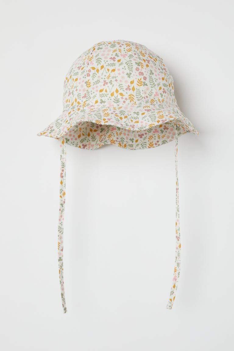 Sun hat in airy, woven cotton fabric. Wavy brim and ties underneath. Lined. | H&M (US + CA)