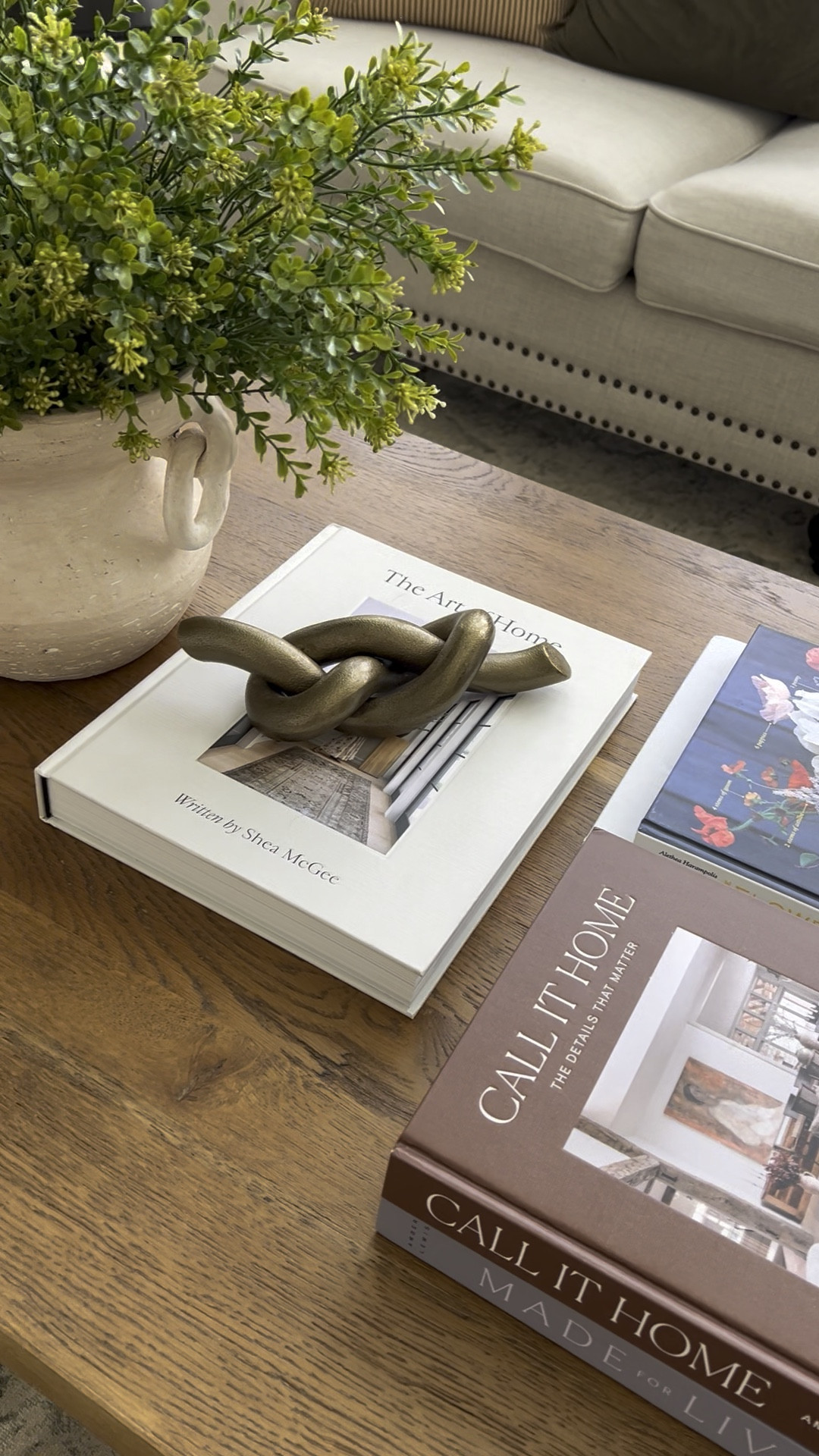 Coffee table decor. Amazing decor finds. Target home decors  studio McGee. Amber interiors. Faux greenery stems. Vintage coffee table. Gold knot sculpture. Shelfie decor  

#LTKHome #LTKFindsUnder100