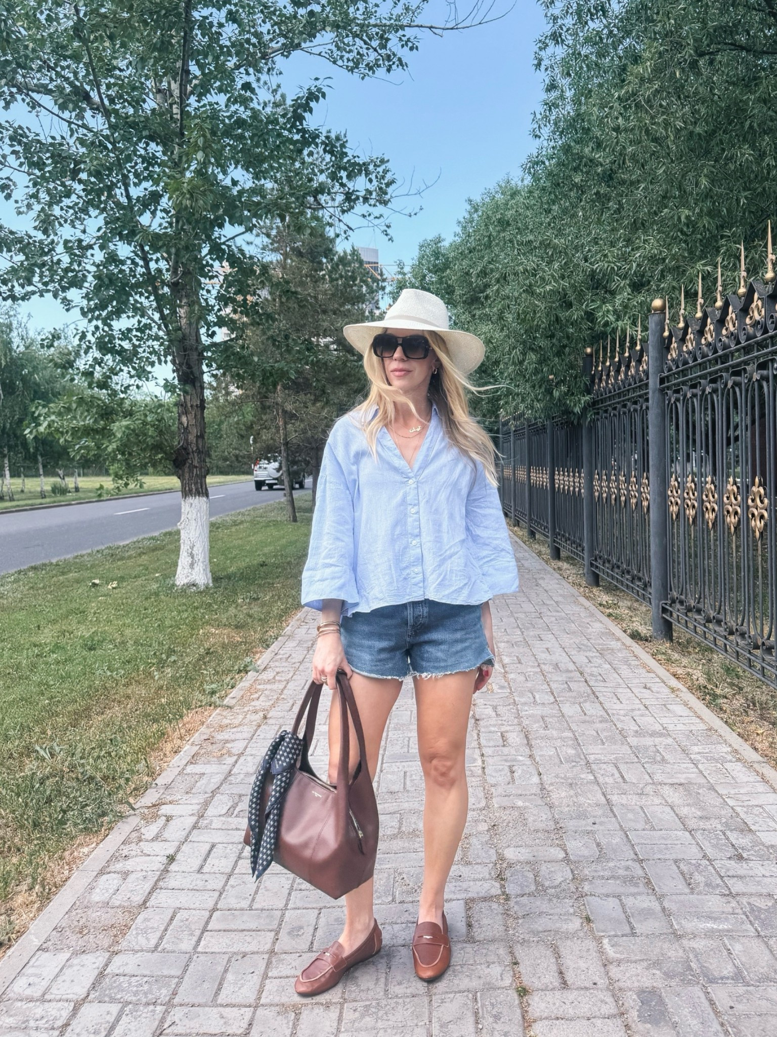 Casual summer outfit with linen shirt, cutoff denim shorts, leather loafers, @Janessa Leone straw hat

#LTKSeasonal #LTKSaleAlert #LTKOver40