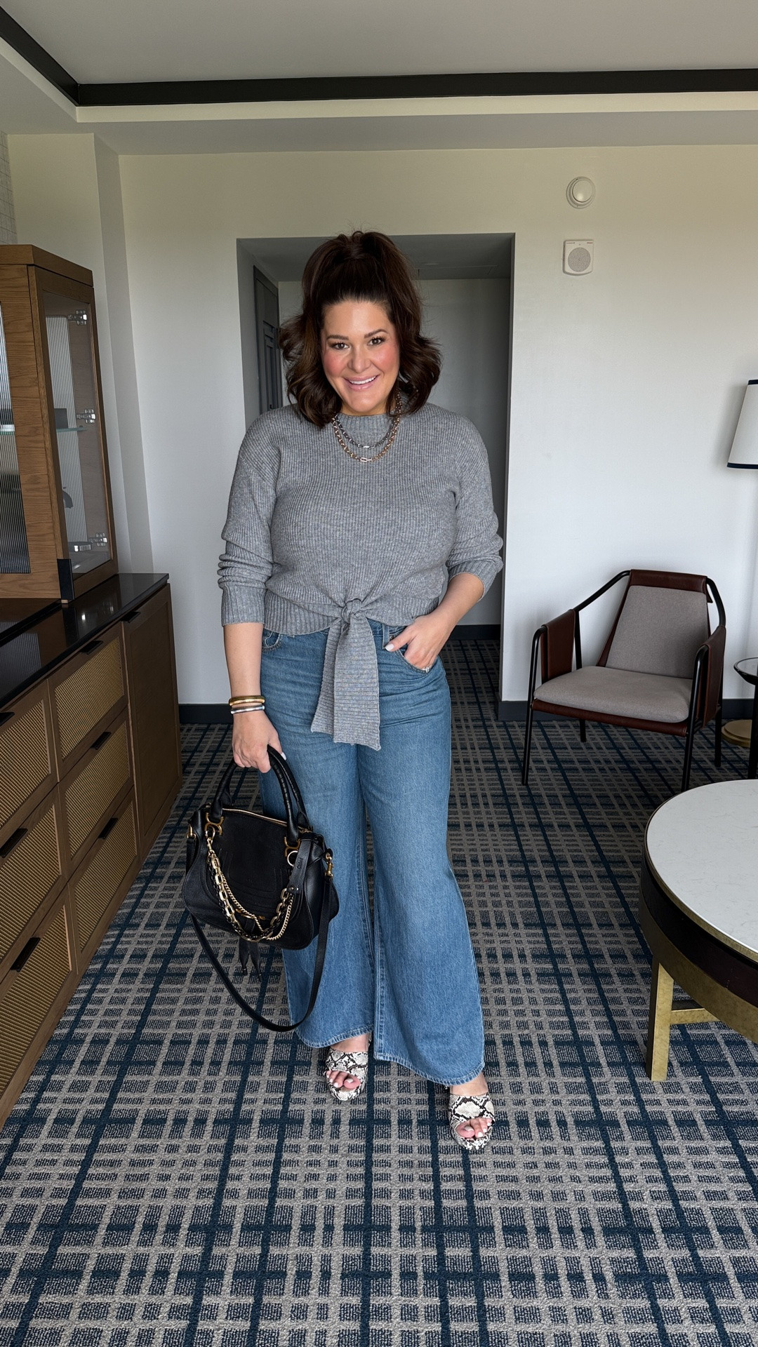 Jeans: 32
Sweater: Large

These wide leg jeans have an ADJUSTABLE WAIST so you can actually customize the fit — aka no more choosing between jeans that fit your hips or jeans that fit your waist. 

Paired them with the cutest gray sweater for an easy fall outfit that feels casual, flattering and put together without trying too hard. This whole look is such a good example of why I love elevated basics you can wear a million different ways.

If you’ve been searching for flattering wide leg jeans, adjustable waist jeans, midsize denim, curvy jeans or easy fall outfit ideas, these deserve a look. 

#midsizefashion #widelegjeans #curvyfashion #falloutfits #midsizestyle

#LTKNYFW #LTKootd #LTKMidsize