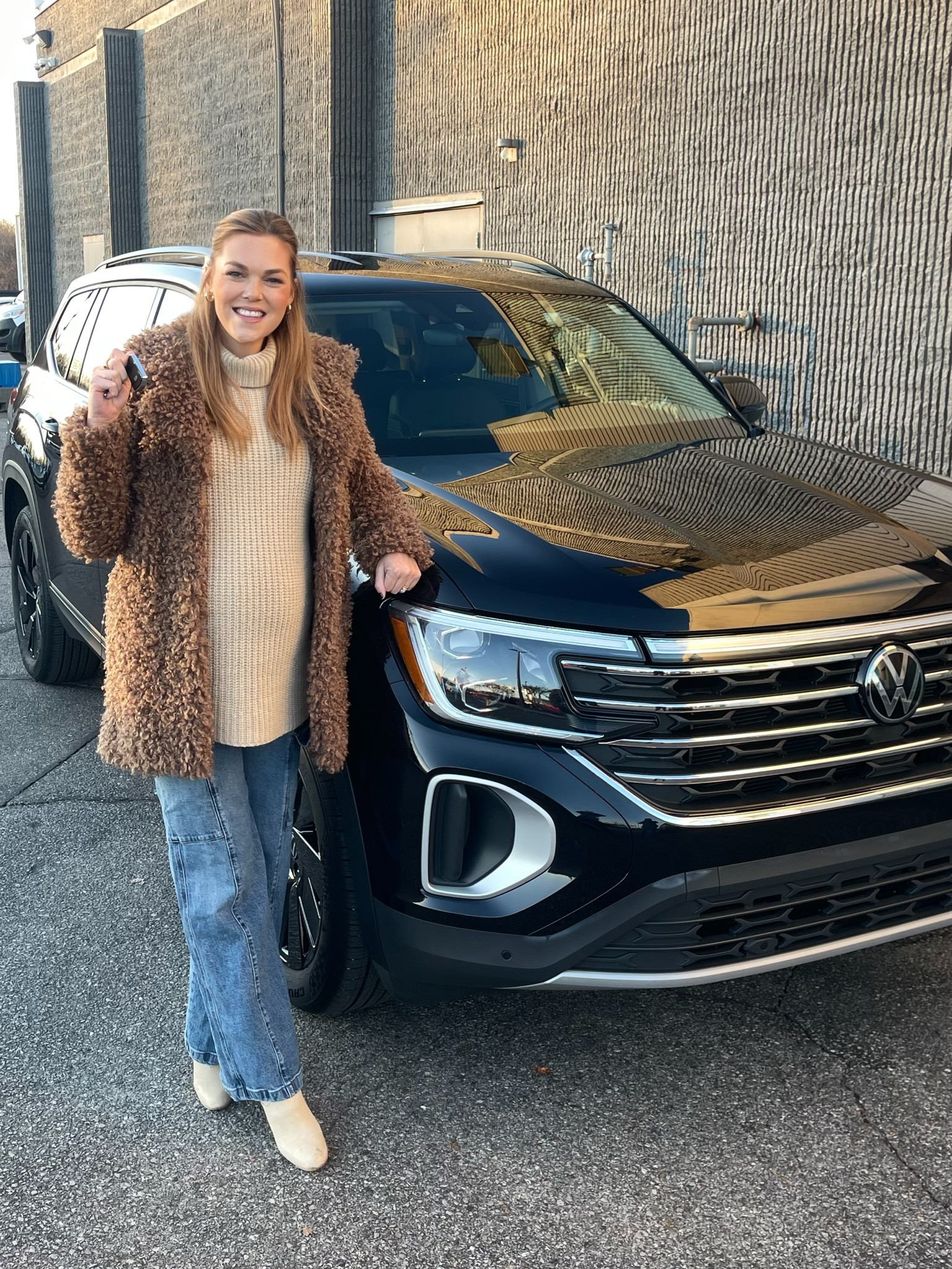 Mom car secured! Bump fit. Maternity jeans. Hudson wide leg cargo maternity pants. Sleeveless tan turtleneck sweater. Brown teddy bear coat. Cream boots. 

#LTKBump #LTKStyleTip #LTKTravel