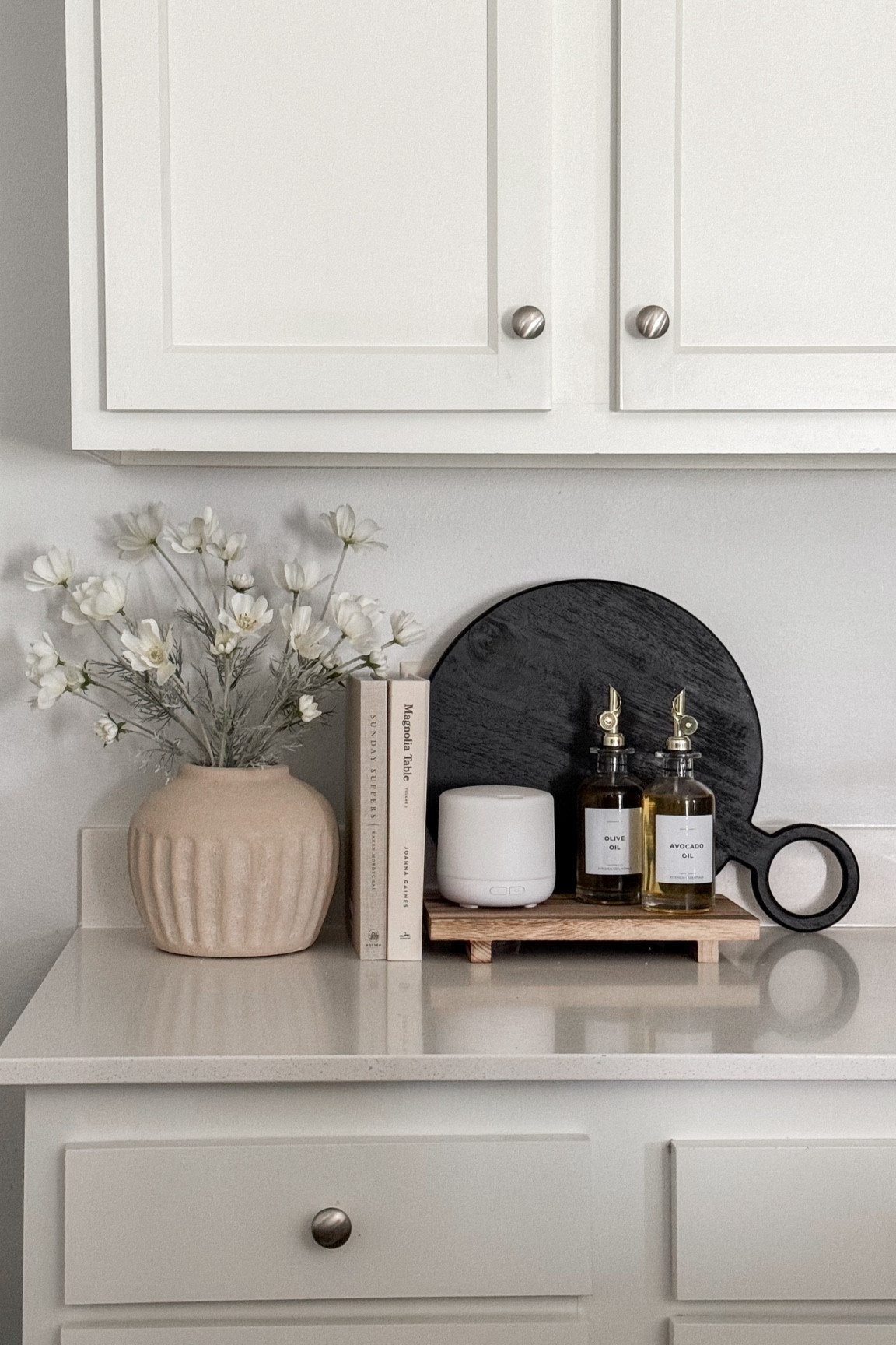 Neutral and functional kitchen counter decor 🤍

Black cutting board is from Pepper & Vetiver!

#LTKFindsUnder50 #LTKHome #LTKFindsUnder100