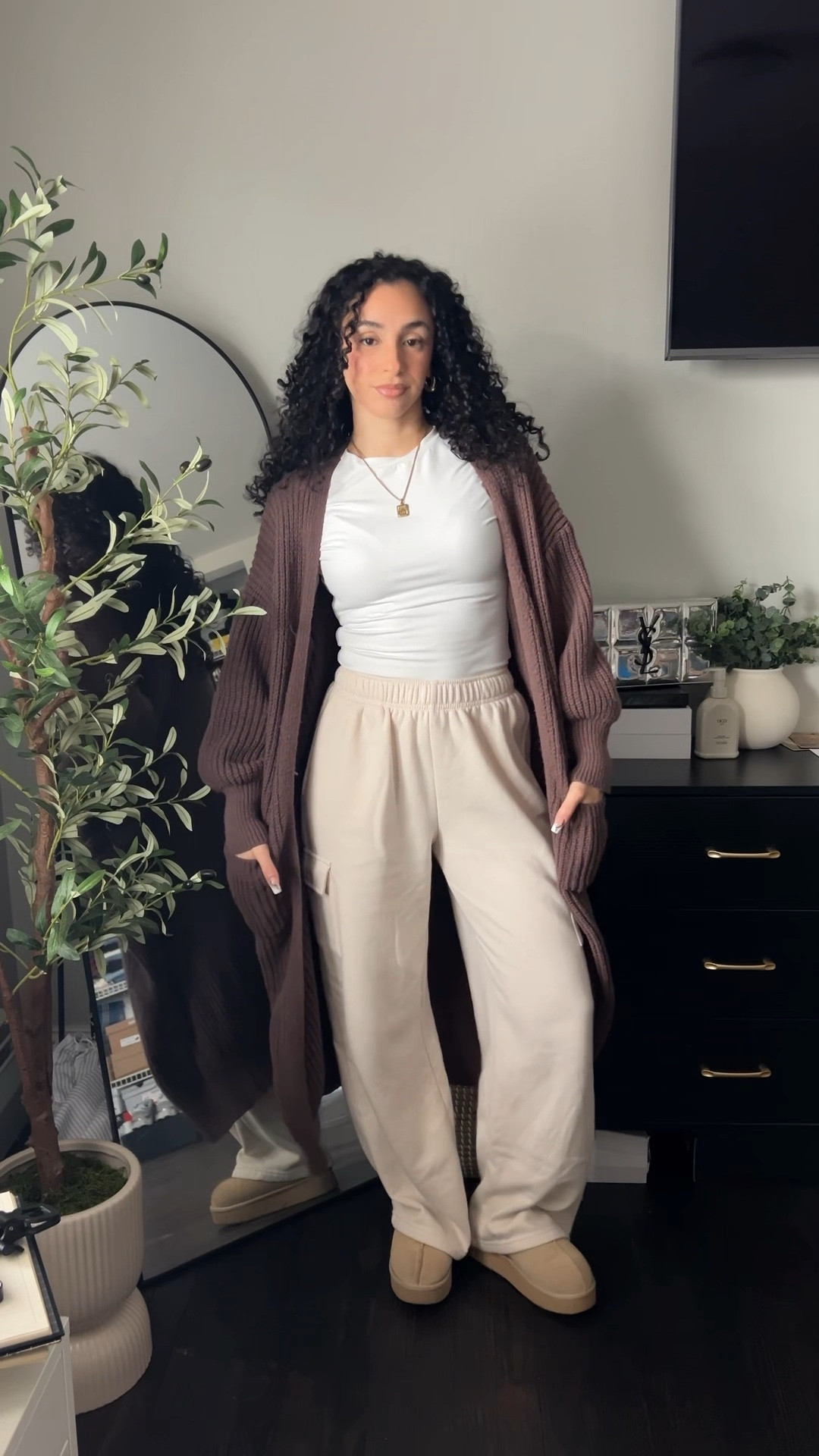 A very realistic stay at home mom outfit because in reality i just want to be comfortable. What’s more comfy than fleece lined sweatpants and a chunky knit oversized cardigan 

#LTKmomlife #LTKPetite #LTKootd