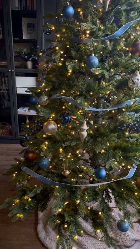 king of christmas tree
7.5 ft prelit alpine fir 
added twinkle lights from target
ornaments



#LTKHoliday #LTKsalealert #LTKCyberWeek