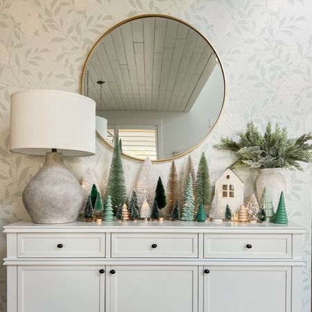 Which Christmas aesthetic are you? I love adding in some color to our Christmas decor! We used bottle brush trees in similar colors and added twinkle lights for a warm cozy Christmas vibe on our dining room side table. 

#LTKSeasonal #LTKHoliday #LTKhome