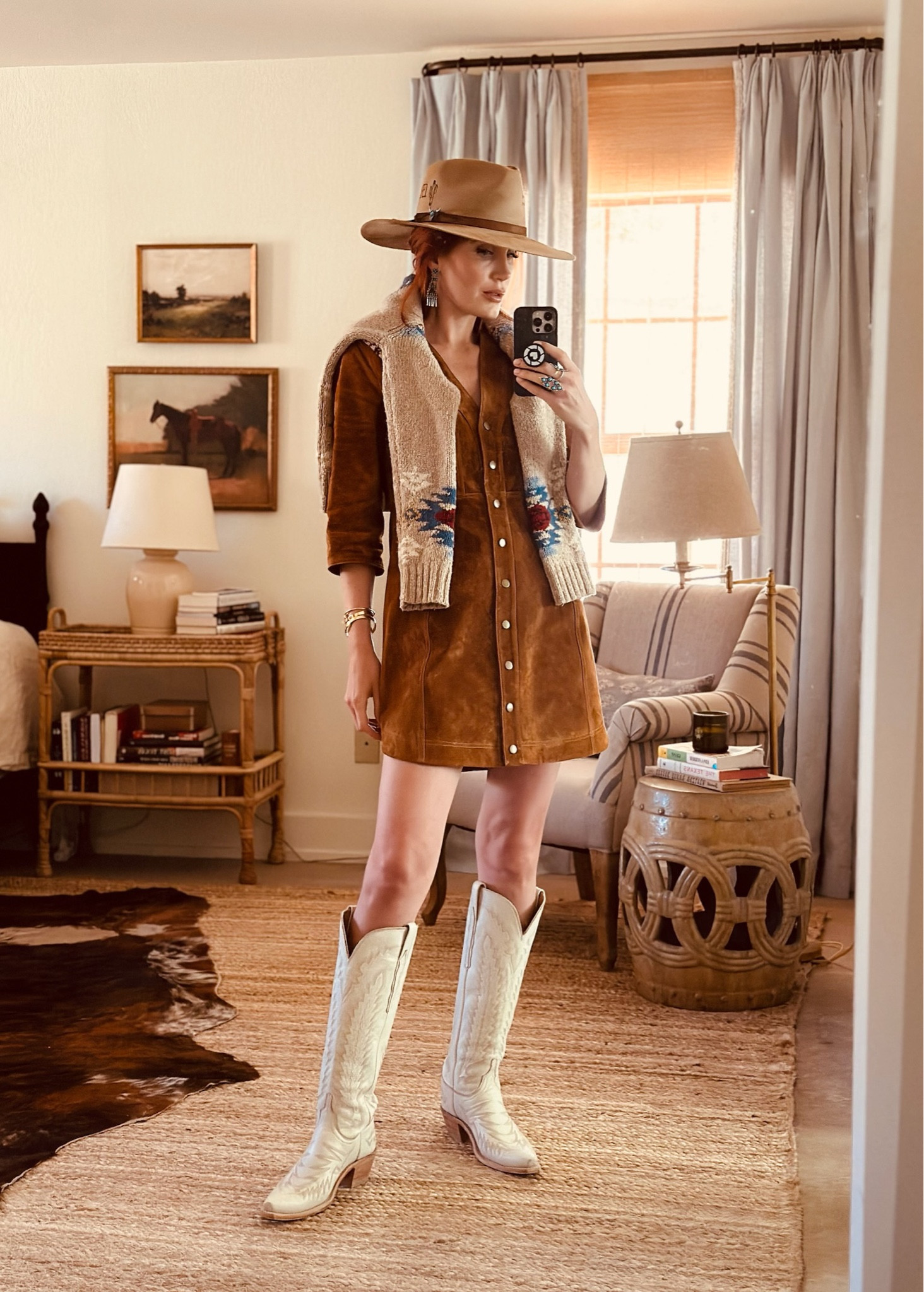 I love how this look came together - I layered this suede dress with a sweater draped over my shoulders and then paired it back with these cowboy boots, the colors tie together so well. I topped it off with my new western hat - it has such cute details and it’s so sturdy, it will maintain its shape over time. 

#LTKStyleTip #LTKShoeCrush #LTKSeasonal