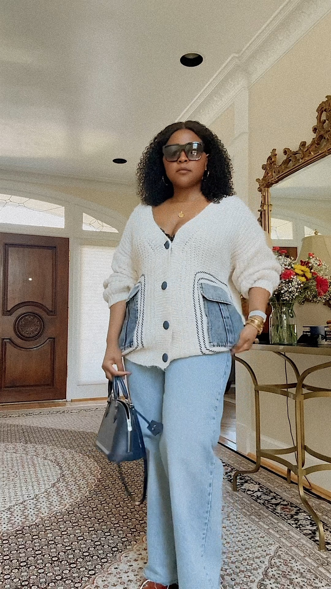 It’s still sweater weather out! Love this oversized cardigan with denim pockets. Styled here with blue jeans & the  JW Anderson chain mules. for a casual look.

#LTKfindsunder50 #LTKsalealert #LTKshoecrush