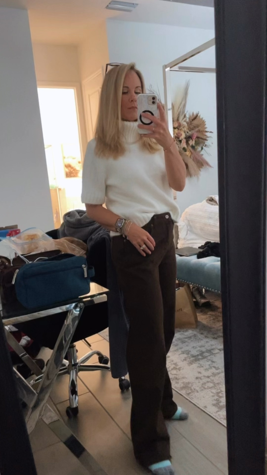 Elevated neutrals done right ✨**
A cream short-sleeve sweater layered over a turtleneck with brown Abercrombie jeans is the definition of effortless winter chic. Clean, classic, and so easy to wear for workdays, lunch dates, errands, or whenever you want to look put together without trying too hard. This is one of those neutral outfits you’ll keep reaching for all season long.

**Keywords:** neutral winter outfit, cream sweater outfit, turtleneck layering, Abercrombie jeans, brown jeans outfit, chic everyday style, elevated basics, winter layering ideas, casual workwear outfit, minimalist fashion inspo, LTK winter style
