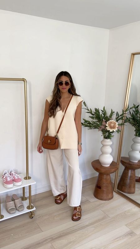Casual elevated spring outfit -- styling these cream barrel jeans (26) with an oversized sweater vest (small) and the most chic sandals 

Spring outifts | spring to summer transition outfits 

#LTKeurope #LTKfindsunder100 #LTKVideo