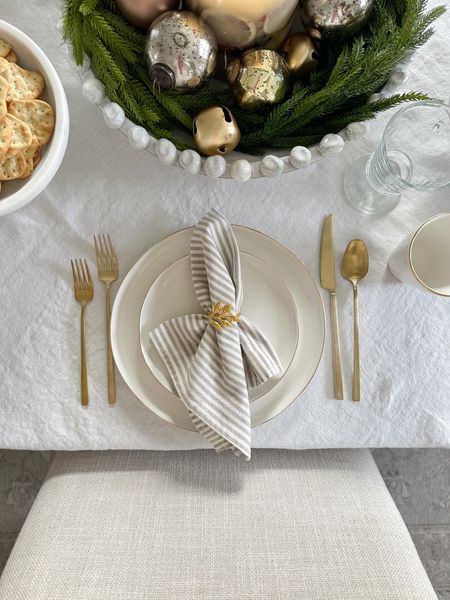 
You’ll never believe these striped linen, cotton, napkins and gold napkin ring are from Amazon! Simple, holiday placesetting. Brass flatware. White and gold porcelain placesetting, French, wine, glasses, marble, serveware, linen table, throw. 

#LTKsalealert #LTKHoliday #LTKhome