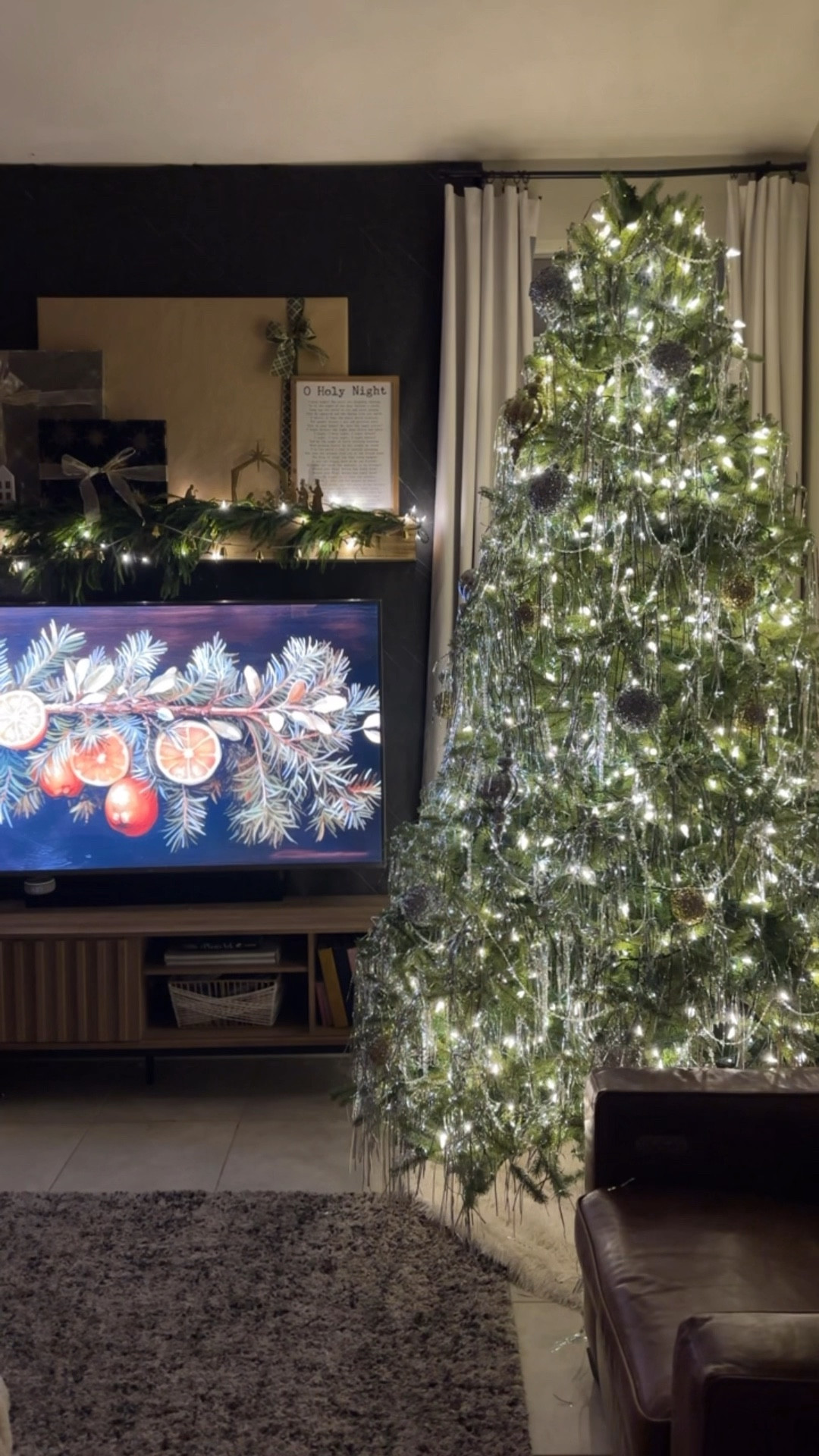 I decided to try something different on our @kingofchristmas 9’ Royal Fir Quick-Shape Christmas Tree and so I bought some tinsel fringe and cute them into 1” strips so there would be less mess. I wanted to go for more of a moody look into this space and I feel like it gave the tree such a glam and ghostly look that I really love! 

What do you think, would you try tinsel out on your tree? 🎄



#kingofchristmas #tinsel #tinseltree #christmasdecor #christmastreeinspo #moodychristmas #glamchristmas #christmasdecor #homedecor #christmastree 

#LTKHoliday #LTKHome #LTKSeasonal