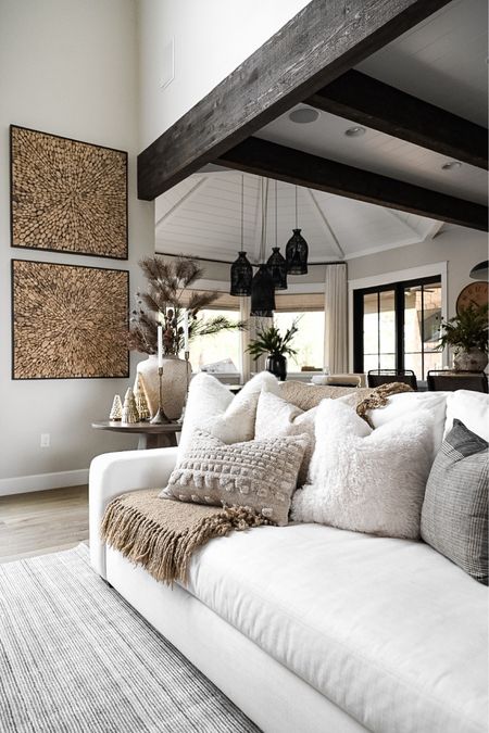 A neutral living room for the holidays  
Wall art is not sold anymore  
Couch pillows. Couch. Home decor. White couch. Pottery barn couch. 

#LTKHoliday #LTKSeasonal #LTKhome