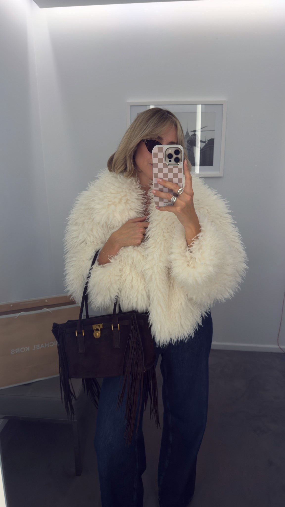 Chocolate brown suede bag, fluffy fur coat, fluffy jacket 

#LTKuk #LTKFashionMonth #LTKautumn