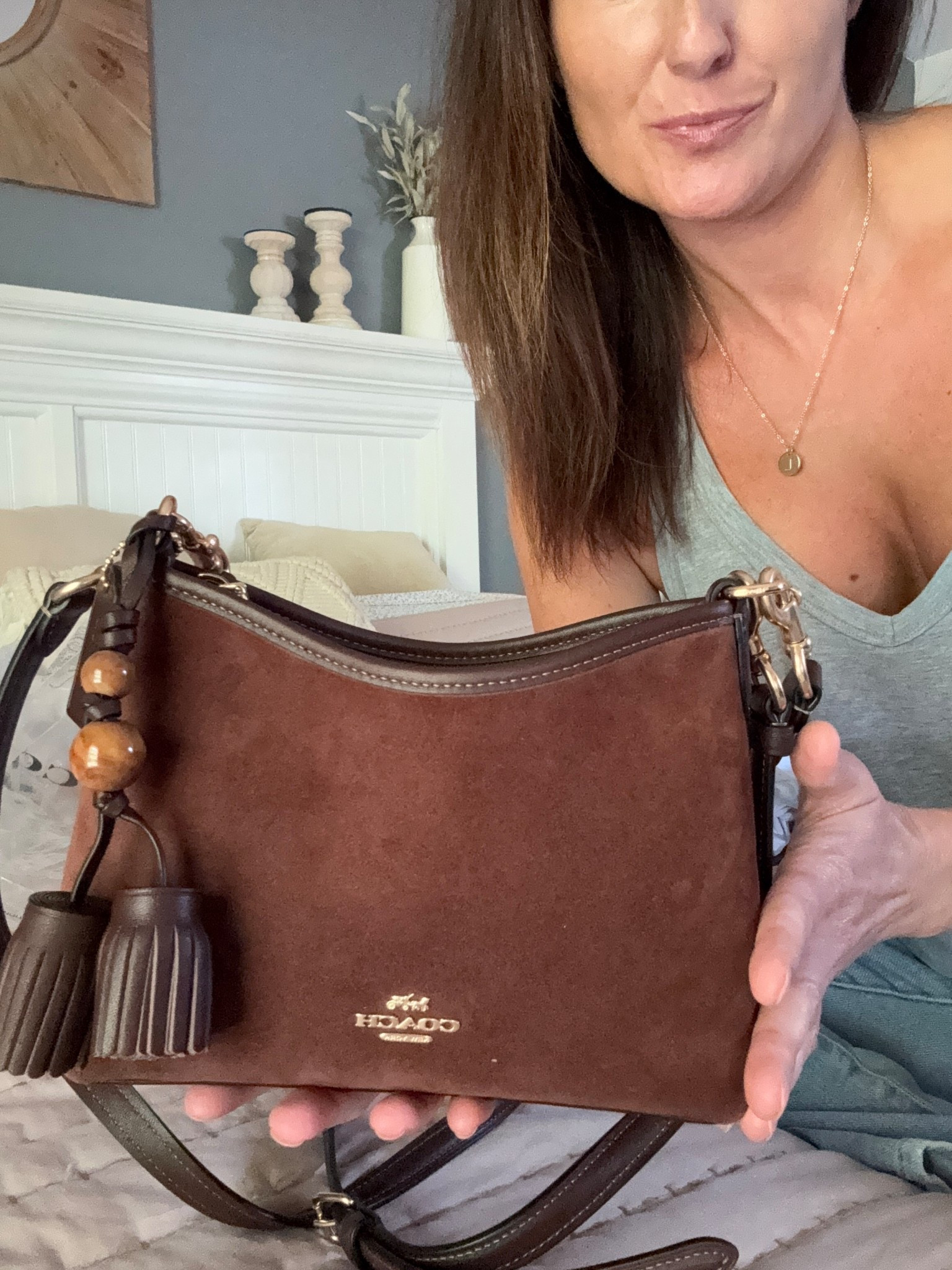 New brown suede purse from Coach! In love with this color for fall. Perfect small size and two strap lengths. Comes in so many colors! Just need to get me a new cute bag charm now ☺️☺️ 
#coach #coachpurse #coachoutlet #fallfashion 

#LTKSaleAlert #LTKWorkwear #LTKItBag