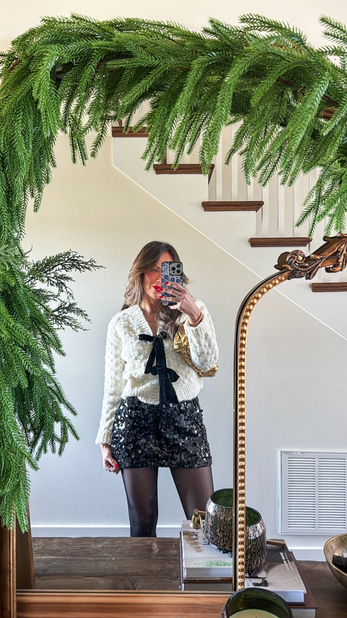 Viral skort holiday outfit! Code KRISMARIE20 works on my red lipstick! In XS skort & sweater. Tights are THE BESTT

#LTKFindsUnder50 #LTKStyleTip #LTKHoliday