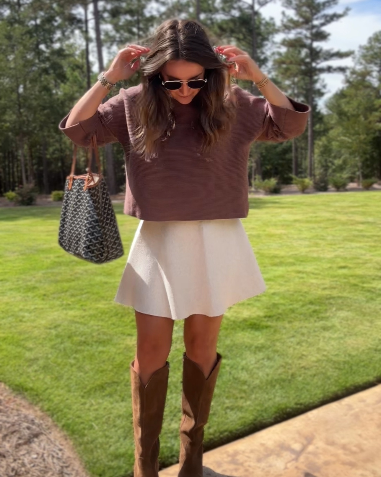 Perfect GA fall outfit. 

Top is the Mattie sweater from The Blue Door Boutique. Wearing a large  

Medium in skirt. I’m 5’8  