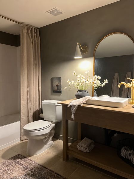 Moody bathroom

Unlacquered brass sconces
Brass arch mirror
Semi mounted sink
Linen shower curtain
Vintage inspired floral art

Amazon home | Amazon finds | studio McGee | amber interiors | vintage inspired bathroom 

#LTKStyleTip #LTKHome #LTKSaleAlert