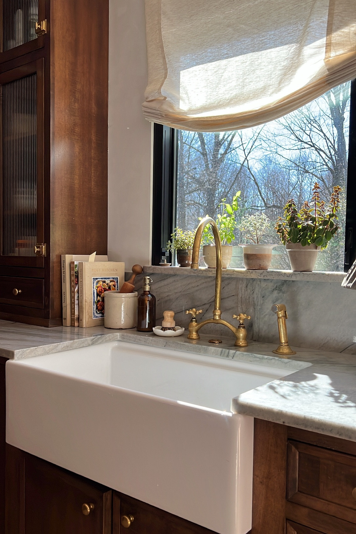 One of the most FAQs about our kitchen is where is your faucet from?! This unlacquered brass beauty has the most gorgeous finish and arched bridge. Sharing this along with all my other favorite sink accessories! 

#LTKhome