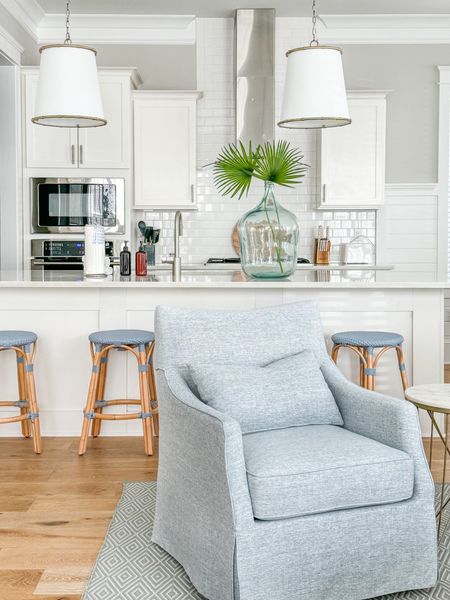 Loving these new swivel armchairs we bought for Hola Beaches, our beach house rental! They’re fairly affordable and are the prettiest blue gray fabric. Also linking our indoor/outdoor rug, blue counter stools and kitchen pendant lights.
.
#ltkhome #ltksalealert #ltkstyletip #ltkseasonal #ltkfindsunder100 #ltkfindsunder50 #ltksalealert coastal decor, coastal living room ideas 



#LTKHome #LTKSeasonal #LTKSaleAlert