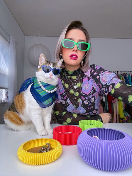 🐱🌈💖✨

Champagne wears black and green mesh turtleneck, long sleeve top, and a purple, bohemian dress, with green sunglasses and silver dangled necklace and silver heart earrings. Pony wears pearls and a blue and green scarf, with dark blue heart sunglasses. 

Dopamine dressing, maximalist, Maximalism, colorful, vibrant, rainbow, cat, cute, matching outfits.

#LTKparties #LTKHoliday #LTKSeasonal