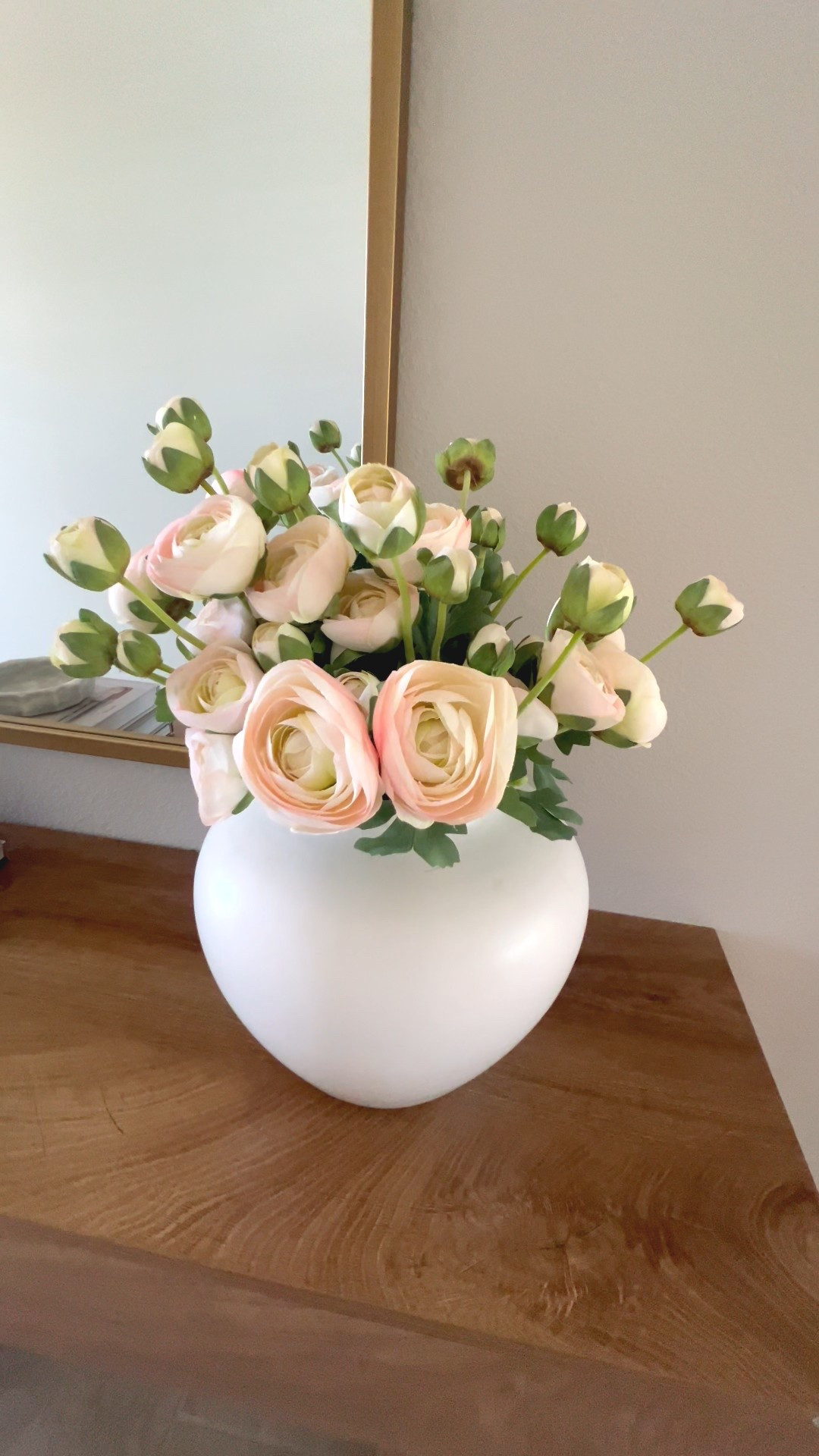 I don’t usually buy pink anything… but these ranunculus got me. They come in other shades, I might get the white too  

They’re one of the few faux flowers I’ve found that actually look real in person. Not shiny, not stiff, not weirdly bright.

I used 2 bundles to get it looking full like this, just so you know. One felt a little skimpy.

If you’ve been wanting something small to freshen things up for spring, these are an easy win. 

Linked them here

#LTKHome #LTKSeasonal