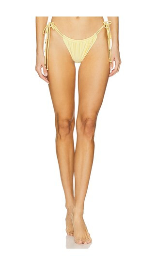 Kyma Bikini Bottom in Daisy Yellow | Revolve Clothing (Global)