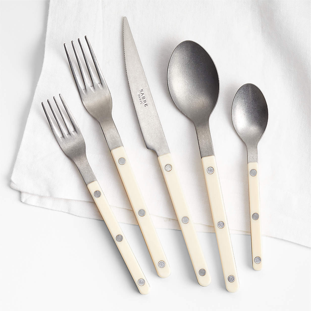 Sabre Ivory 20-Piece Flatware Set + Reviews | Crate & Barrel | Crate & Barrel