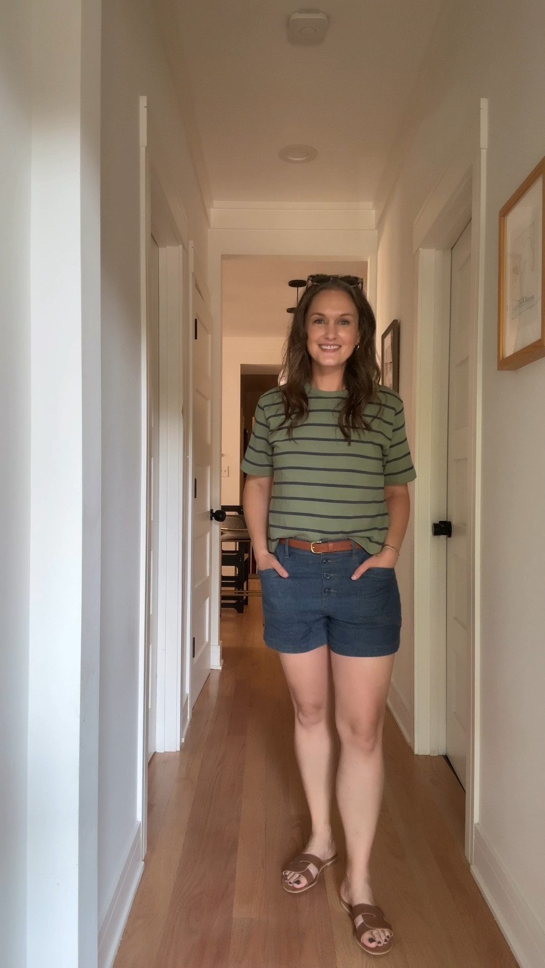 It’s a bright Friday in August, and the city mom is effortlessly chic in blue linen shorts and a green-and-navy striped tee, the kind of outfit that feels as breezy as the morning itself. Brown sandals keep her grounded between poses, while her go-to gold hoops, layered herringbone and graduated rope necklaces, and her new stack of permanent bracelets—topped with a diamond tennis bracelet—add just the right touch of sparkle as she moves through the day. The morning flies by at a photoshoot in preparation for The Chicago Literary Salon, made all the more fun by the photographer and her former-student-turned-friend, whose laughter and encouragement bring her vision vividly to life. Now, with her shots wrapped and her excitement buzzing, she’s ready to pick up her son from daycare and kick off a weekend filled with airplane acrobatics and waterfront fun at the Air and Water Show, all while feeling completely herself in her signature mix of comfort and cool.

#LTKWorkwear #LTKShoeCrush #LTKStyleTip