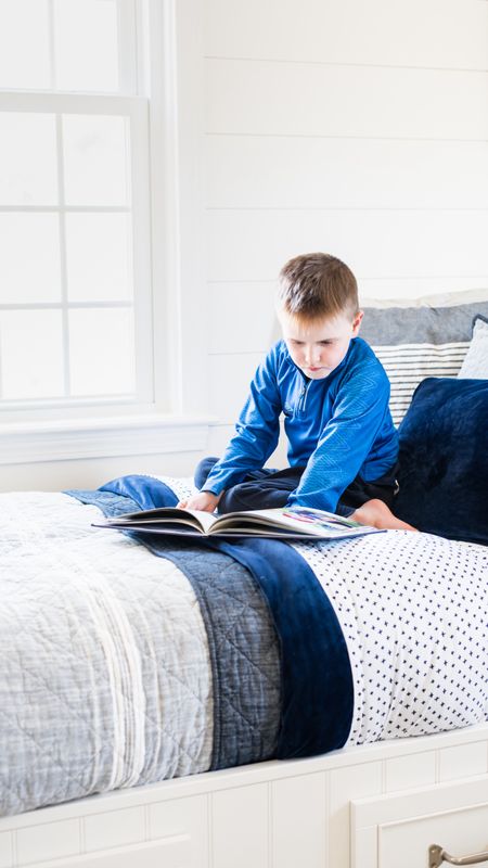 Shared boys bedroom with pottery barn furniture, storage beds, blue and white bedding, coastal theme, nautical themed kids room

#LTKfamily #LTKkids #LTKhome