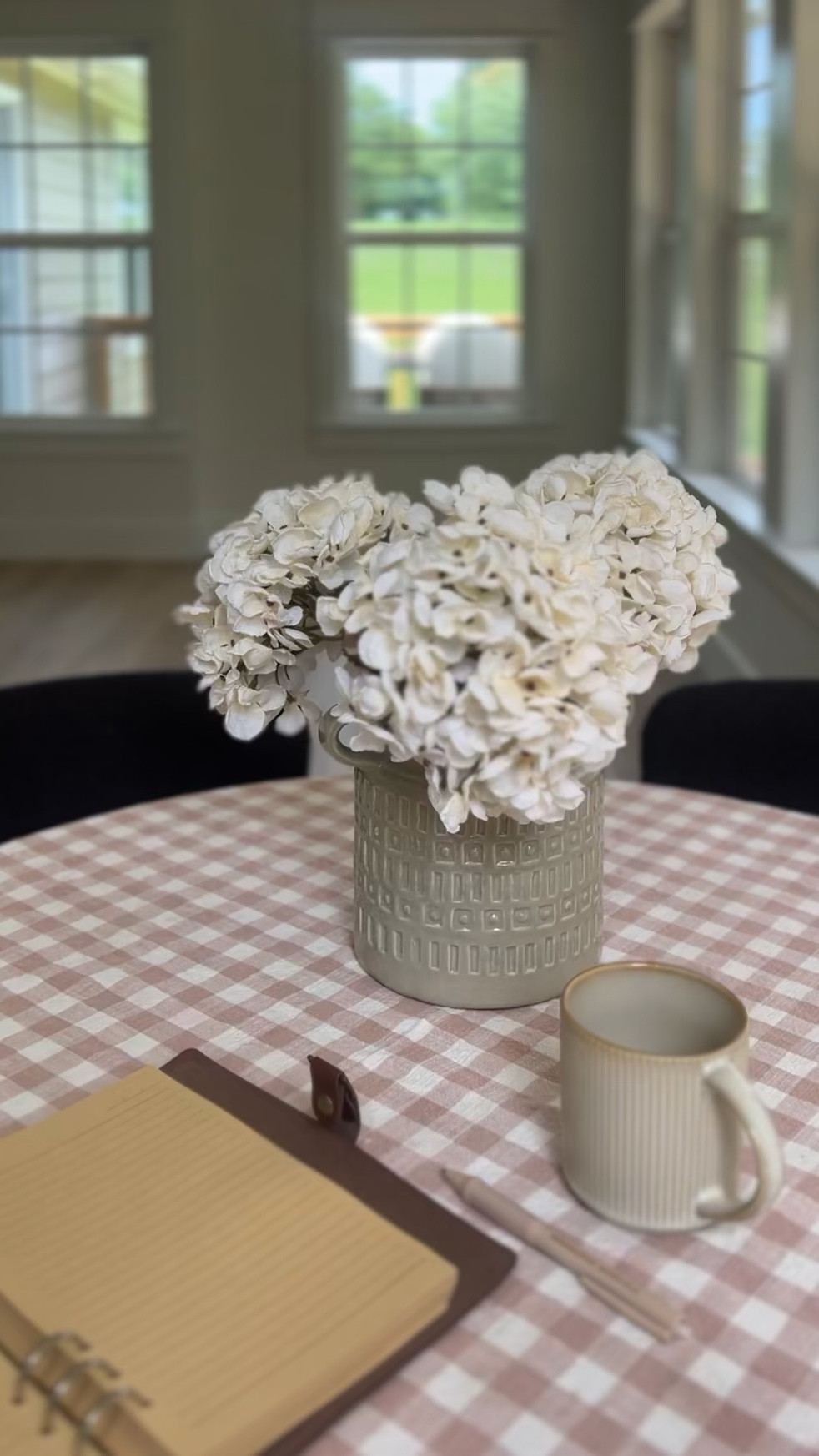 The prettiest faux hydrangeas I ever did see — they look just like real dried flowers. 

Also linking my leather journal, gingham tablecloth and favorite ceramic coffee mug so you can create your own cozy corner for journaling and daydreaming.

#LTKSaleAlert #LTKHome #LTKSeasonal