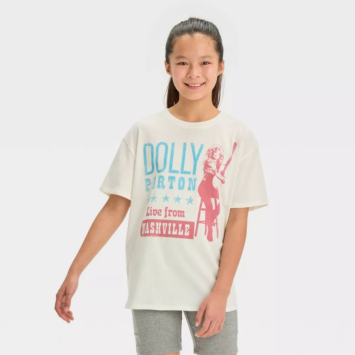 Girls' Oversized Dolly Parton Graphic T-Shirt - art class™ Sour Cream | Target