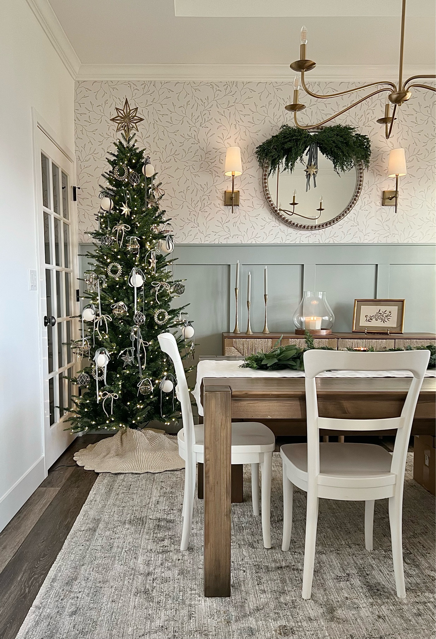 Christmas Dining Room 

Dining table / dining furniture / cline chair / dining chairs / tree skirt / loloi / rug / Home Depot tree / grand duchess / slim tree / tree topper / gold accents / chandelier / brass chandelier / wall sconces / pottery barn / amazon / candles / studio mcgee / picture easel / garland / Target / hearth and hand / arched cabinet / neutral decor 

#LTKHoliday #LTKHome #LTKFindsUnder100