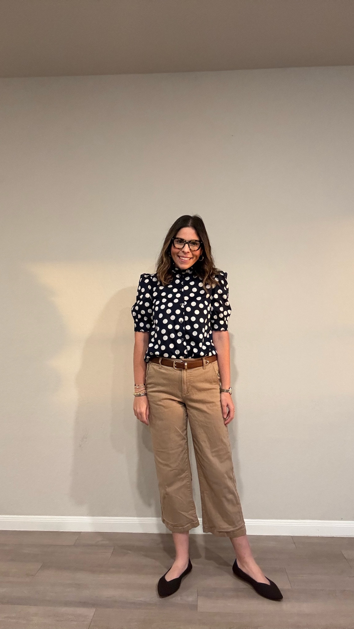 Here’s a caption for your LTK post:

✨ Polka dots + khaki = the combo I didn’t know I needed! 🖤 Obsessed with this navy & white dot blouse — the puff sleeves and mock neck make it feel so elevated. Paired with wide-leg crop trousers, a cognac belt, and dark pointed flats for that smart-casual sweet spot. Tortoise frames tie it all together! 🤎

#LTKstyleinspo #LTKfindsunder100 #LTKworkwear

#LTKWorkwear #LTKMothersDay #LTKootd
