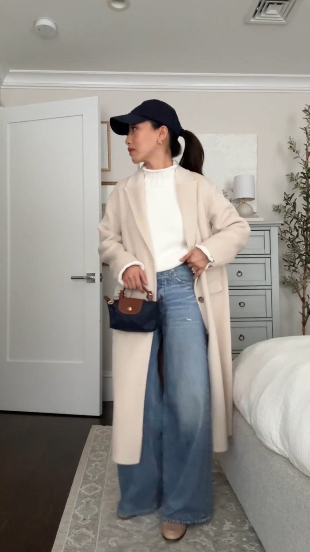 👇 read denim sizing!

• Jcrew cotton sweater xxs, oversized fit, thicker knit, mine has shrunken a little bit in the dryer 

• Rag and Bone “Miramar Sofie Ankle" jeans sz 23. Runs big so go down 1 size at the waist for Sofie or Andi styles . “ankle” is actually long with a 30” inseam that I shrunk shorter to 27.5”.

HEADS UP: All Miramar styles shrink in length if machine dried. I machine dried on medium for about 20 min at a time and checked til length was perfect for me.

Also linked the Andi cropped I had which fit the same except with 26.5” inseam - do NOT machine dry these! 

• Gentle Souls booties 5.5, size up half if between sizes since the front toe felt a little narrow across. Very comfy 

• Sam Edelman loafers 5.5. If between two half sizes, go up.

• Longchamp mini bag with Amazon detachable strap kit

• Polo hat

• J.Crew double face wool coat from last year XXs petite fyi “double face” means not lined so it will NOT be as warm as a lined coat. Also linked aritzia which are beautiful but again on the thinner side

Easy mom outfit, spring style , petite friendly sweatpants jeans, chunky sweater 

 

#LTKPetite #LTKmomlife #LTKootd