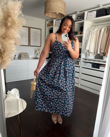 How beautiful is this sundress?! The color and print is so nice and I love the rope detail! It ties in the back too! Runs TTS and I’m wearing an XL although I could’ve taken a Large. 

#LTKmidsize #LTKfindsunder50