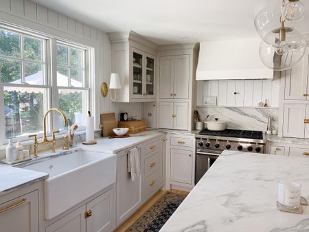 Our creamy, neutral kitchen is 99% finished just waiting on our unlacquered brass pot filler. I wanted a timeless look with natural materials like marble and vertical shiplap so we could love this design forever. Shop the look and follow @pennyandpearldesign for more home style and interior design. 



#LTKstyletip #LTKhome #LTKfamily