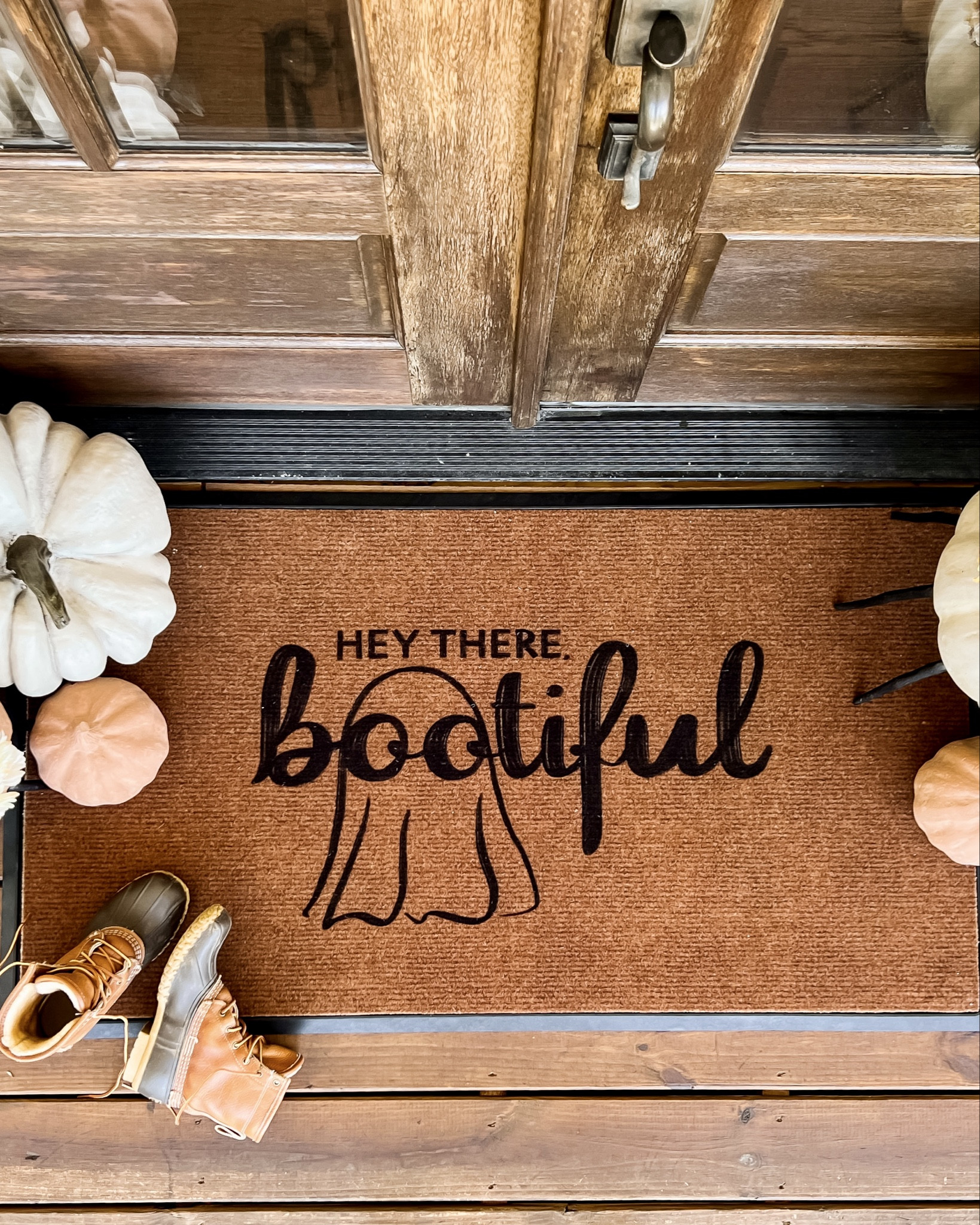 Fall porch decor and front door decorations. I loved this doormat from ruggable and the terracotta pumpkins from pottery barn are the best! Loved this look from last season! 

#LTKStyleTip #LTKHome #LTKSeasonal