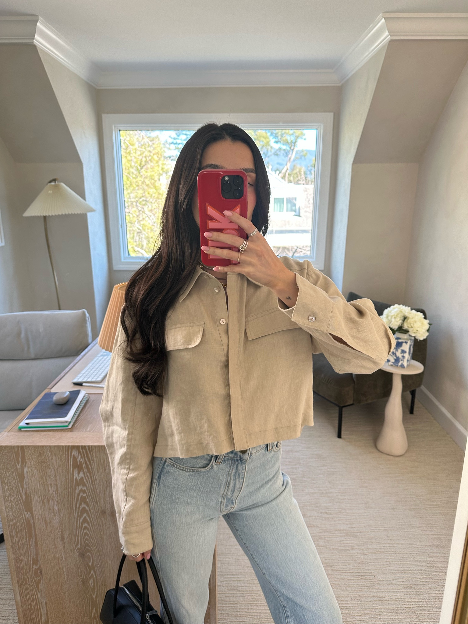 Love this top as we transition to spring. Perfectly cropped and lightweight! Jeans are Sezane that I can no longer find online. Bag has been one of my go tos.

#LTKItBag #LTKStyleTip
